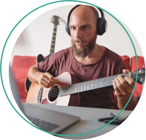 Adult practicing guitar